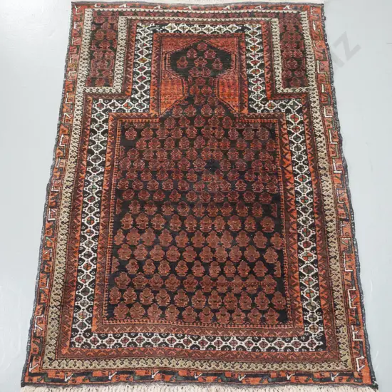 Persian style hand knotted prayer or small floor rug - intricate geometric reds, blacks, browns, cream - some fading