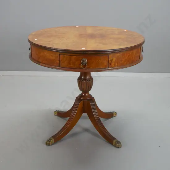 vintage walnut drum table with 2 working drawers, 2 false drawers, with cast metal lion's head handles, on fluted