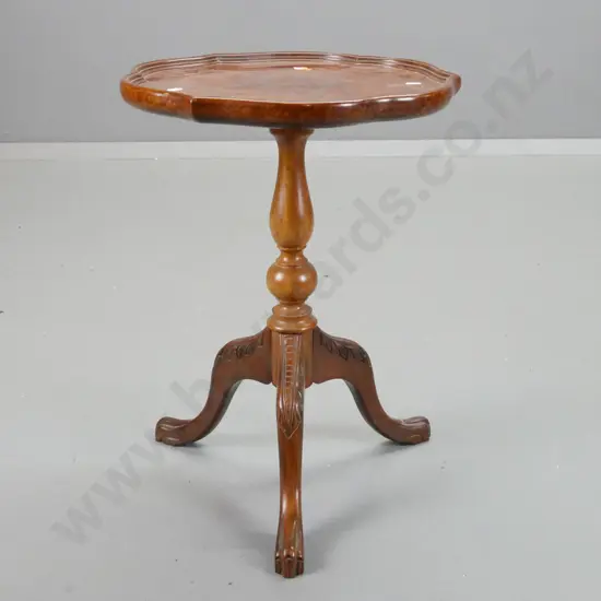 reproduction dished walnut-topped wine table with turned mahogany base with 3 shaped and carved feet - rubbing and some