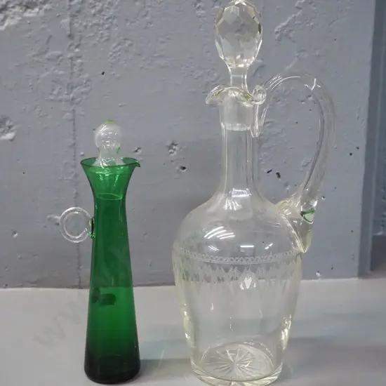 clear etched crystal stoppered decanter H-300 W-120 and a small fine green and clear glass stoppered bottle
