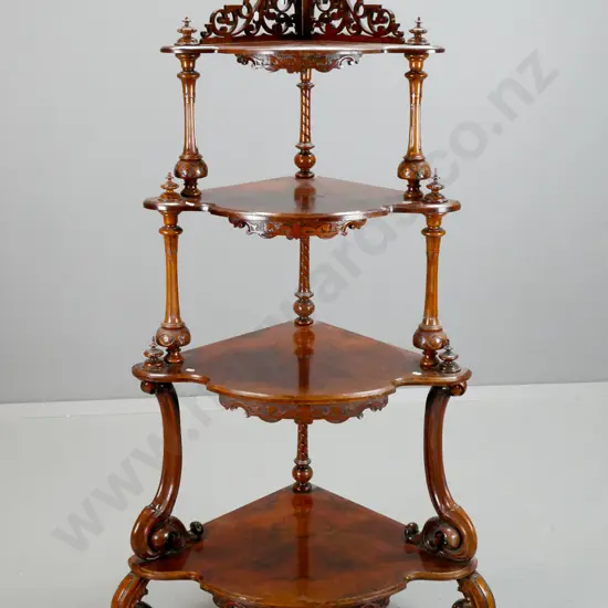 Victorian walnut 4-tier corner whatnot with shaped fronts, carved & pierced top gallery, turned and carved finials,