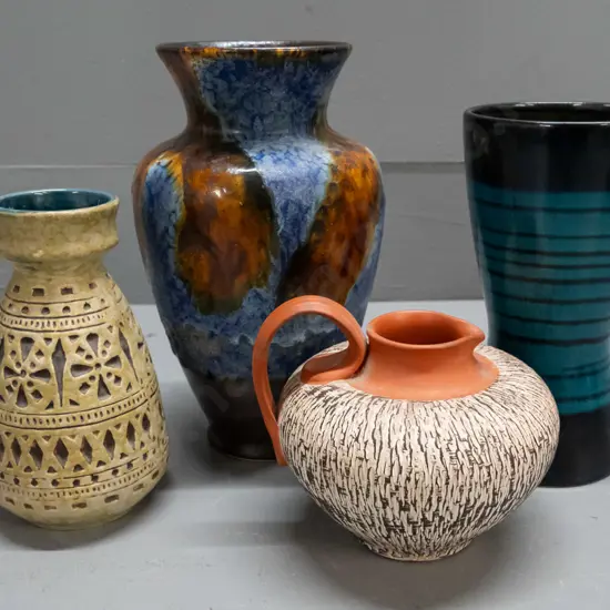 4 German pottery vases - 2 are jug shaped, one with small rub mark inside rim, tallest lava pattern blue has firing