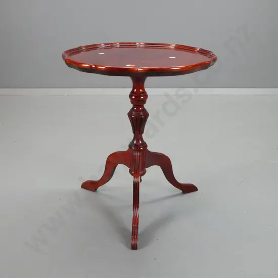 vintage mahogany wine table with scalloped shaped top, fluted turned base on 3 scrolling legs - some scratches to top.