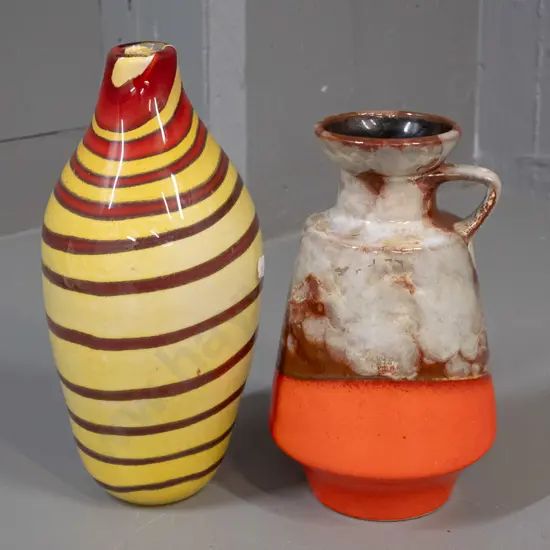 German pottery vase and a heavy art glass vase with red and yellow spiral pattern - glass vase has slightly uneven base,