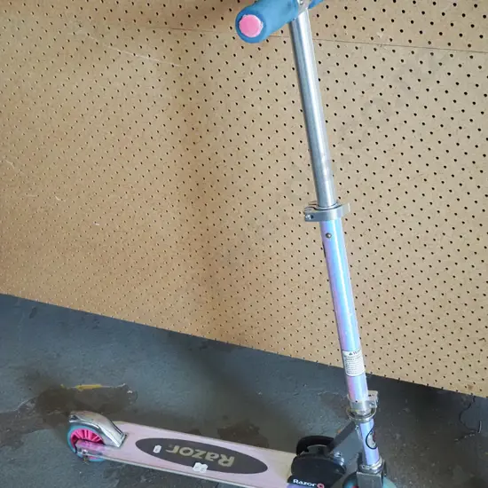 Silver and pink razor scooter
