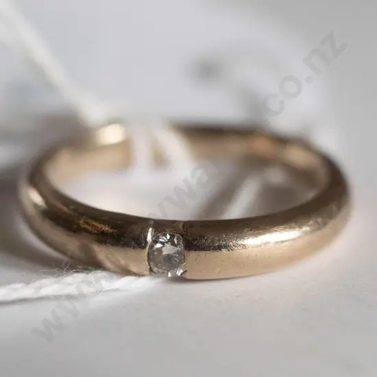 Silver ring with small clear stone