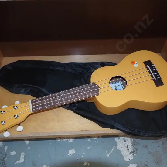 Yellow Ukulele in black bag