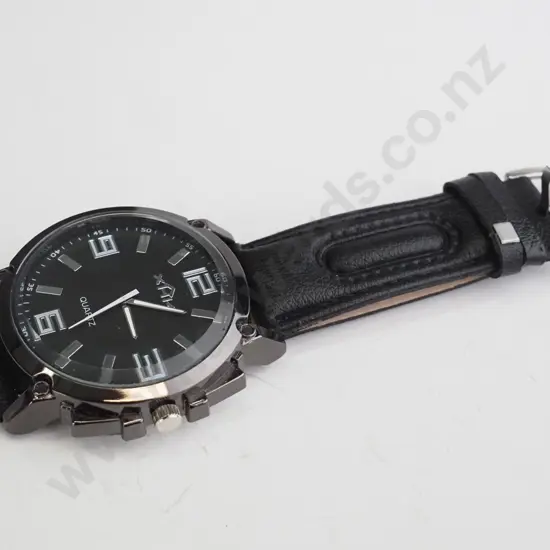 Black XHN Quartz watch.