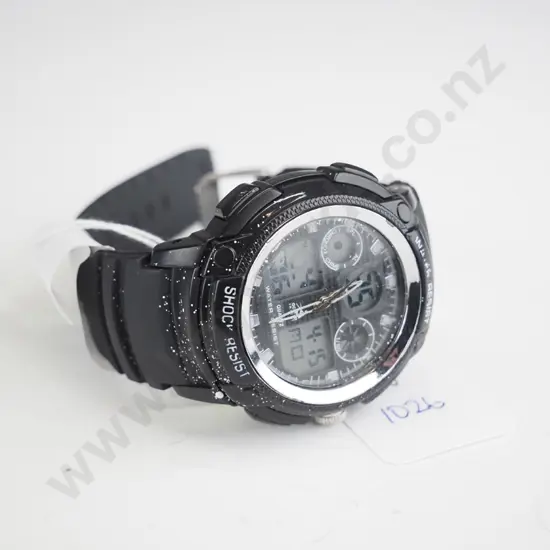 Black watch men's style, round face.