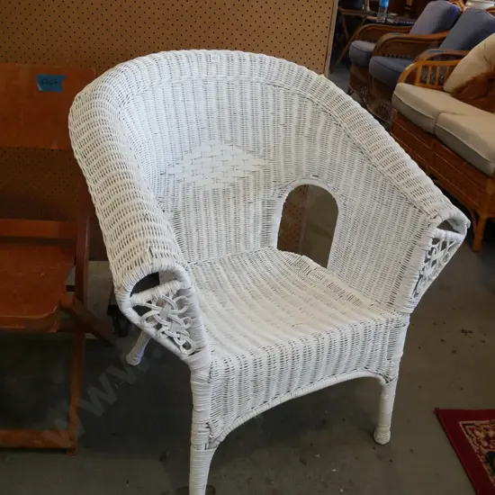 white painted cane armchair