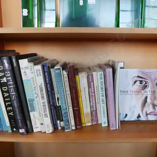 bay of art books; drawing, woodworking etc