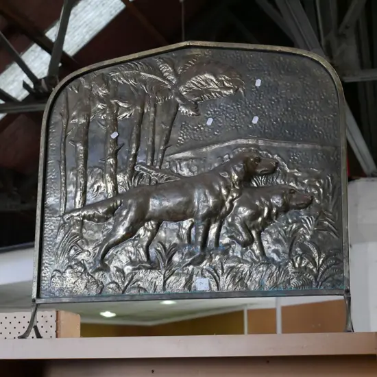 pressed brass firescreen - dogs