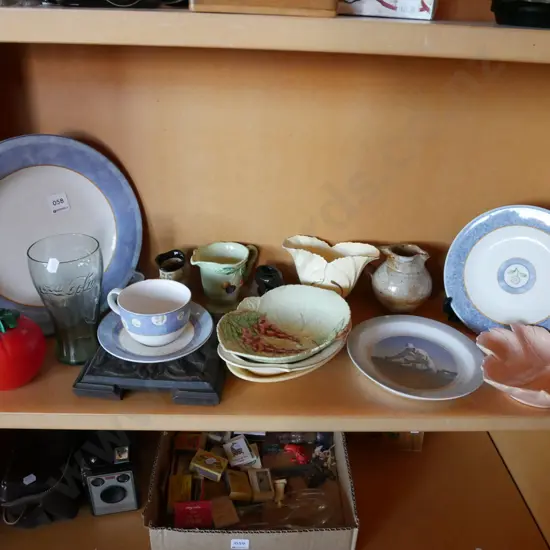 shelf; plates, vases, tomato sauce bottle etc