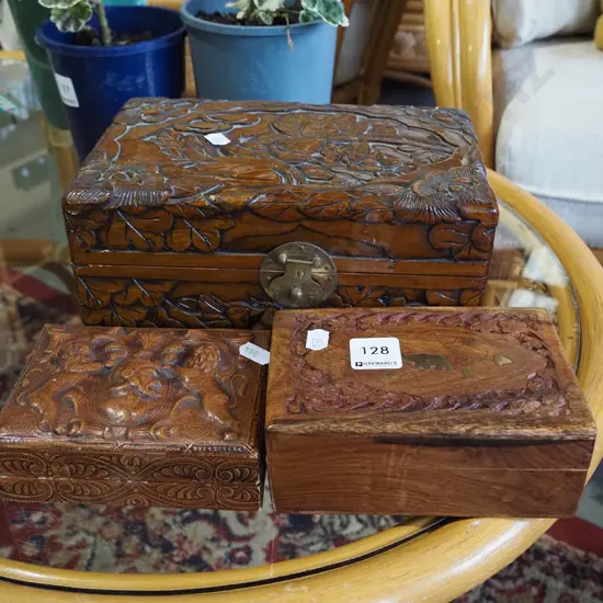 2x carved wooden trinket boxes, 1x leather embossed cigarette case
