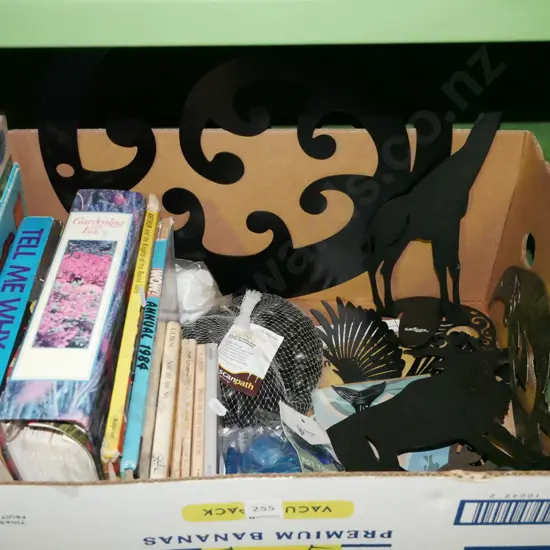 box; books, cut out metal art, decorative stones etc