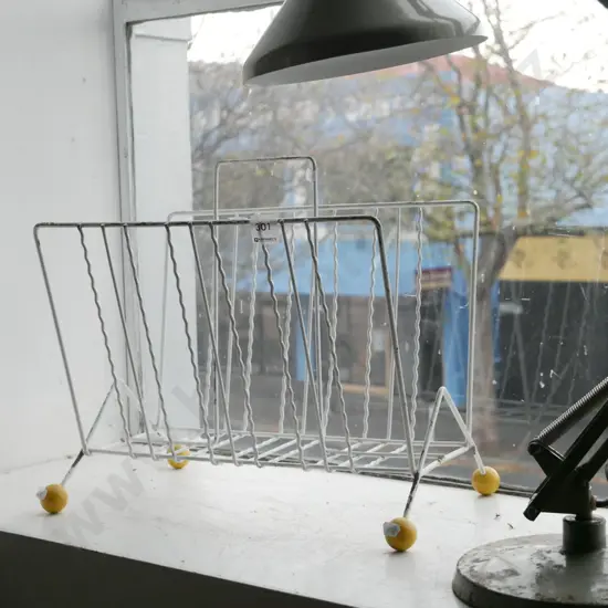 mid-century metal magazine rack