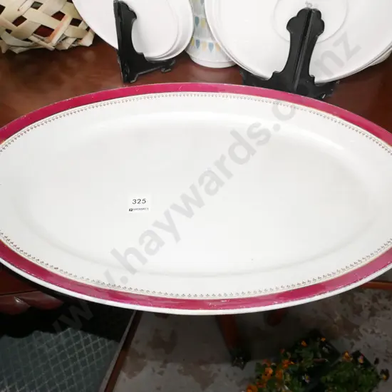 large red rimmed ashet