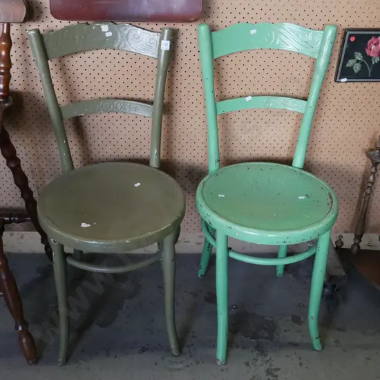 2 painted pressed wood dining chairs