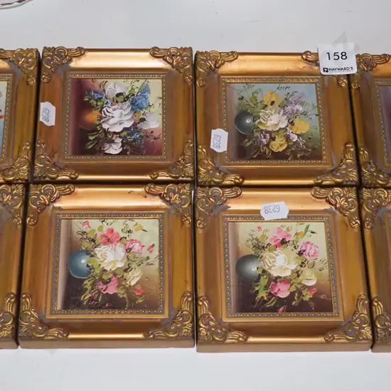 8 small gilt framed floral oils