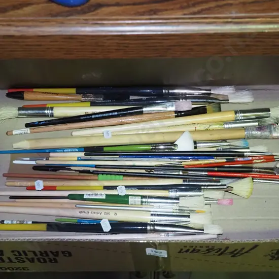 box of artist's paint brushes