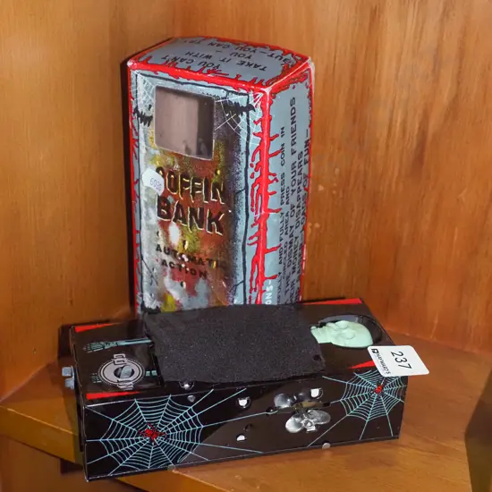 novelty coffin clockwork money box