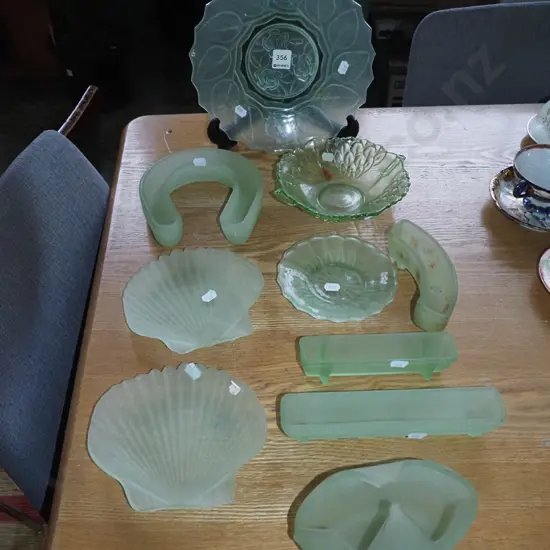 assorted green depression glass items