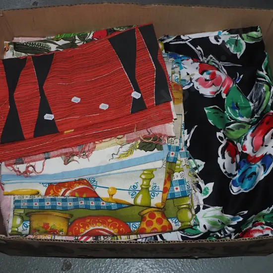 box of fabric pieces