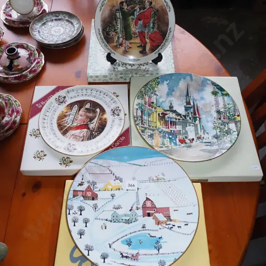 4 cased Christmas themed cabinet plates