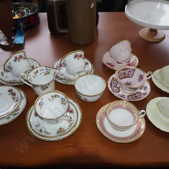 assorted trios, cups, saucers, cream & sugar