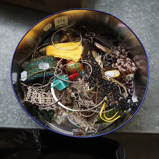 tin of costume jewellery