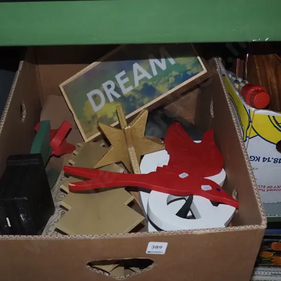 box of wooden cutout letters, birds, a lightbox, etc.