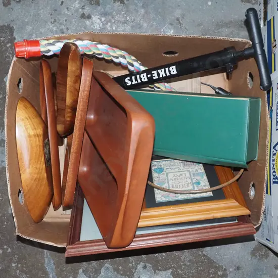 box of framed needleworks, wooden bowl/tray, vintage hair dryer, bike pump etc