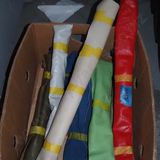 box of coloured leather rolls