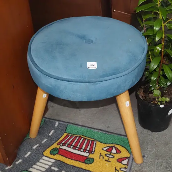 blue upholstered 3 legged stool