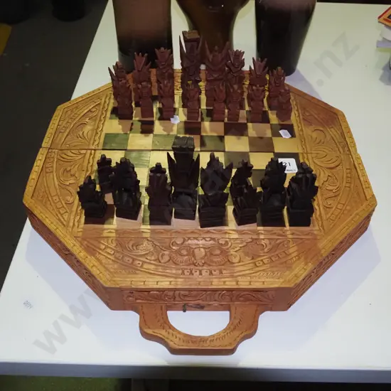 carved wooden chess set
