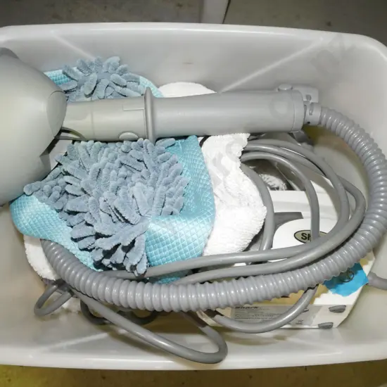Shark steam cleaner in plastic tub