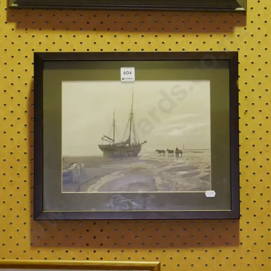 framed reproduction photograph - boat on beach