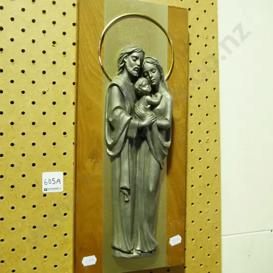 brass and wood religious wall plaque