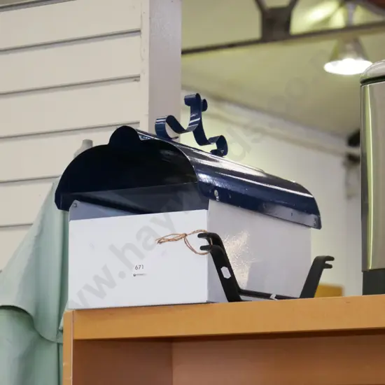letterbox and a pair of iron door handles