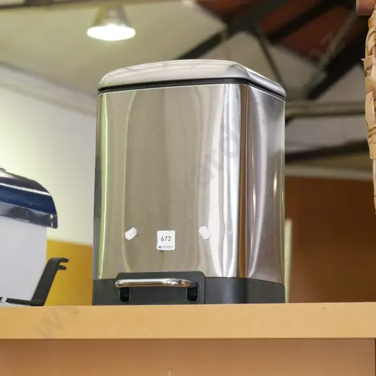 small metal flip top rubbish bin