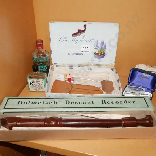 recorder in box, retro cologne, paua brooch etc