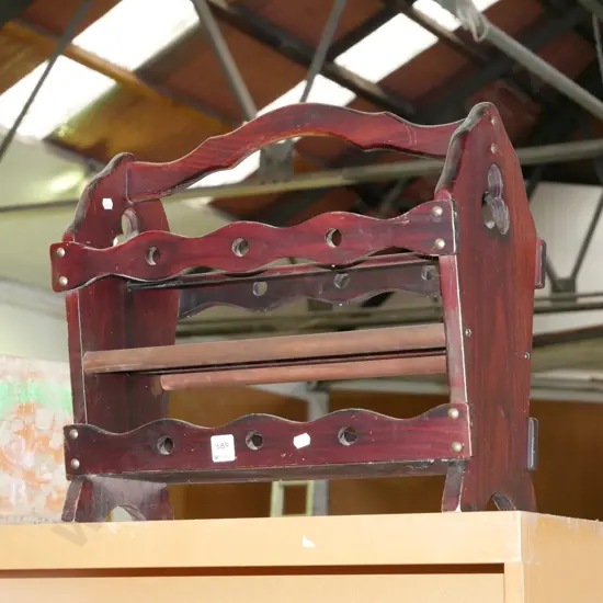 dark stained magazine rack