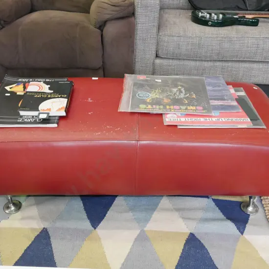 chrome & red vinyl ottoman, cracks to vinyl