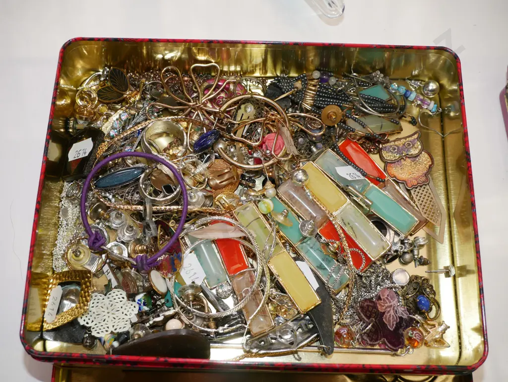 tin of costume jewellery Image 1++