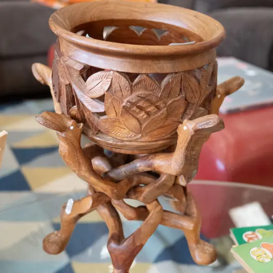 carved wooden jardiniere and stand