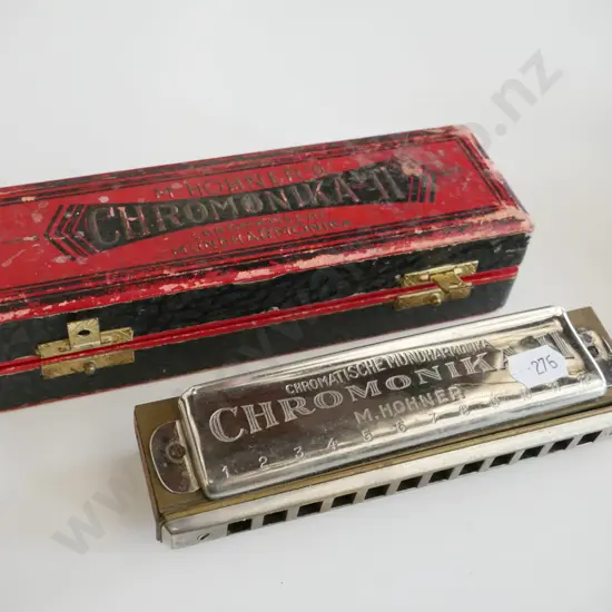 cased charomonica, harmonica
