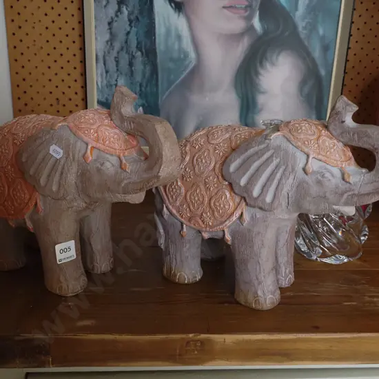 2x carved wooden elephants