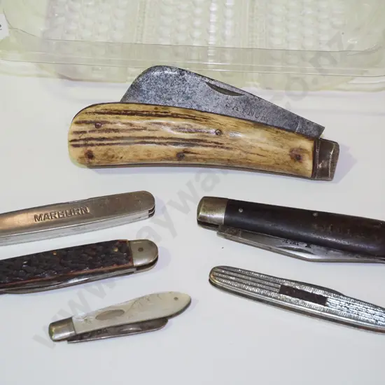 tray of pocket knives