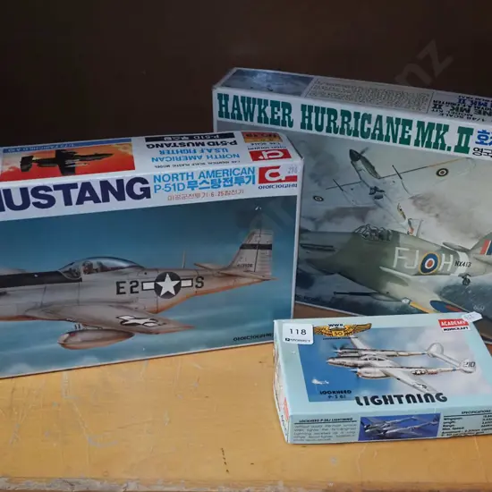3x yet to be assembled model aircraft