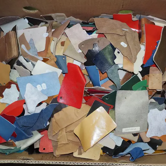 box of scrap leather pieces